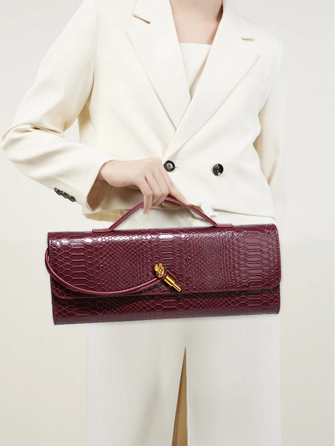 Savra Linear Clutch Bag
